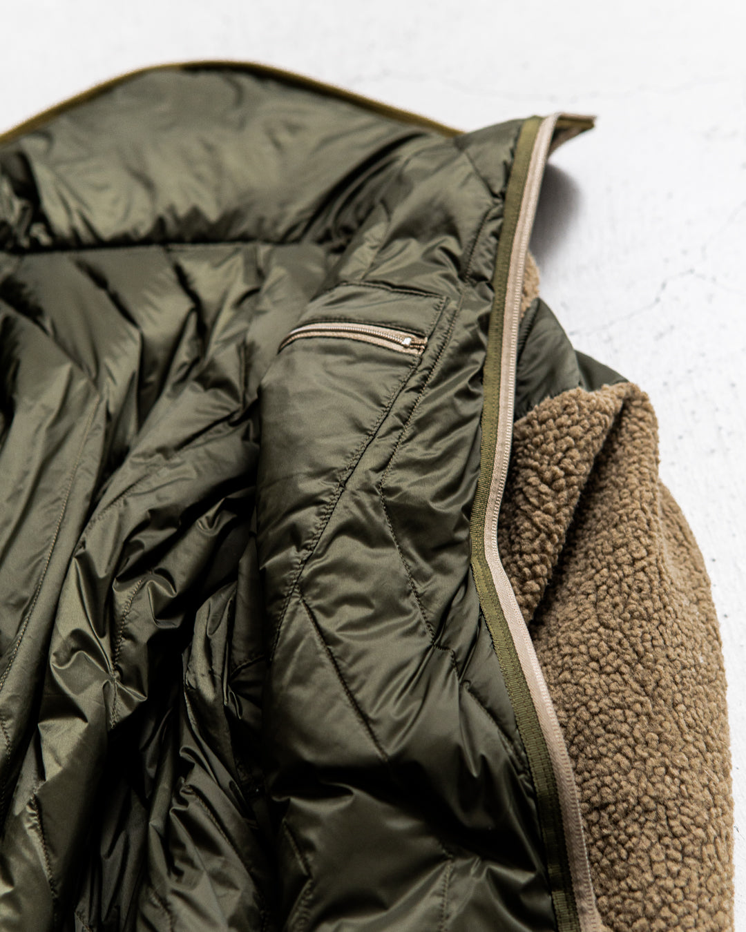 【collaboration】 is-ness × TAION REVERSIBLE FLEECE DOWN JACKET