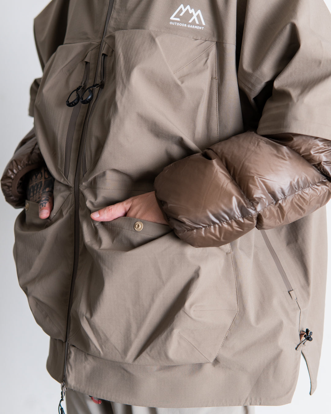 CMF OUTDOOR GARMENT GUIDE SHELL COEXIST