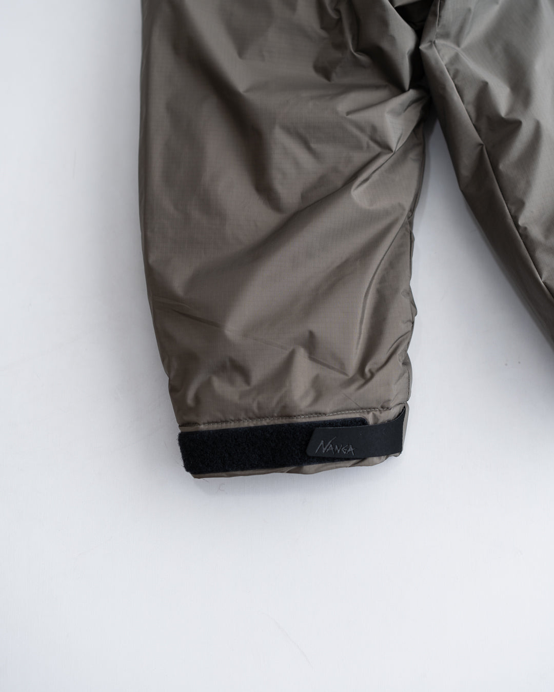 NANGA AURORA TEX STAND COLLAR DOWN JACKET