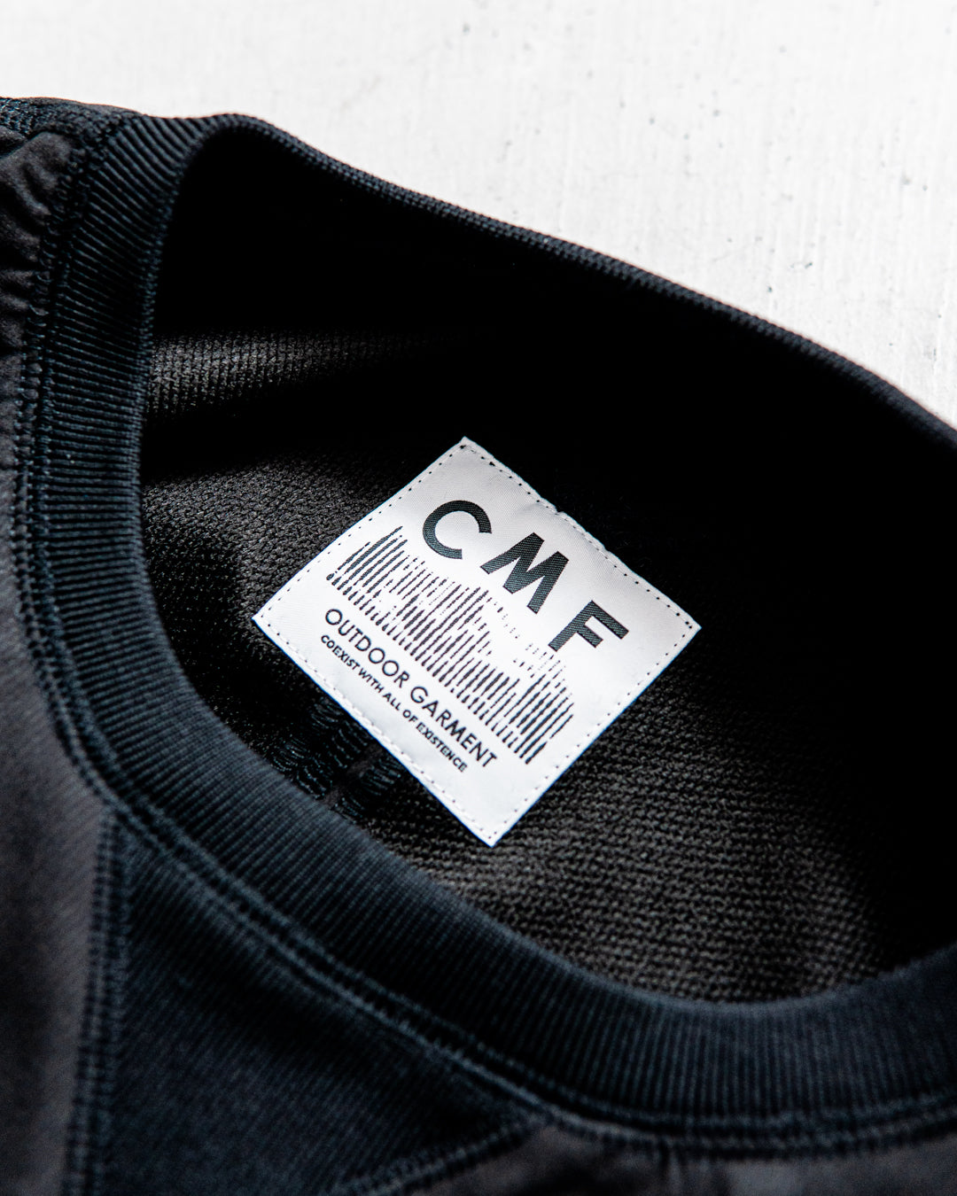 CMF OUTDOOR GARMENT DIVIDED SWEAT