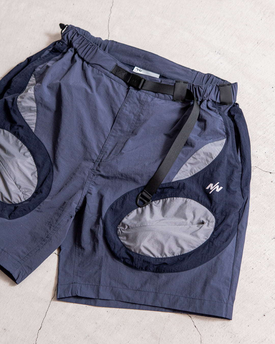 NINE point NINE Lagoon Transparent Pocket Shorts