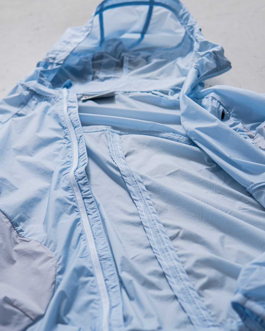 NINE point NINE Lagoon Transparent Windbreaker Jacket