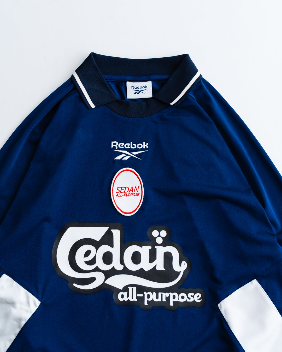 通販] SEDAN ALL-PURPOSE(セダンオールパーパス) Reebok / L/S Game