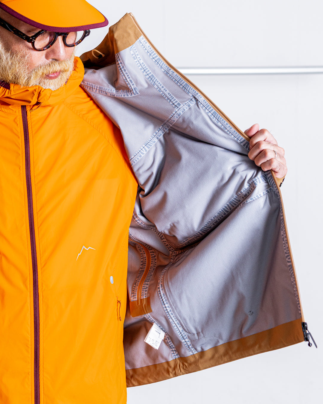 【limited】HUNTING WORLD CRAFTED BY DESCENTE.LAB HARD SHELL ASYMMETRY FIELD JACKET