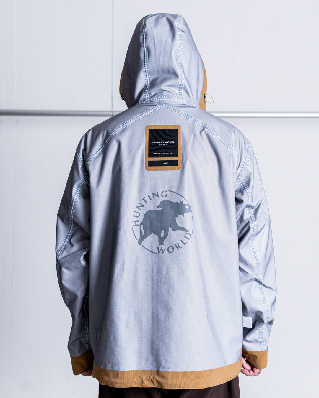 【limited】HUNTING WORLD CRAFTED BY DESCENTE.LAB HARD SHELL ASYMMETRY FIELD JACKET