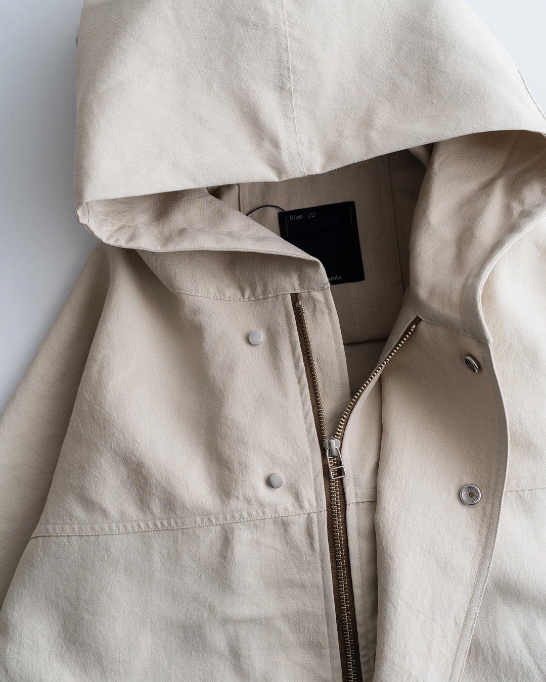 meanswhile Desert Cloth Neutral Hooded Blouson