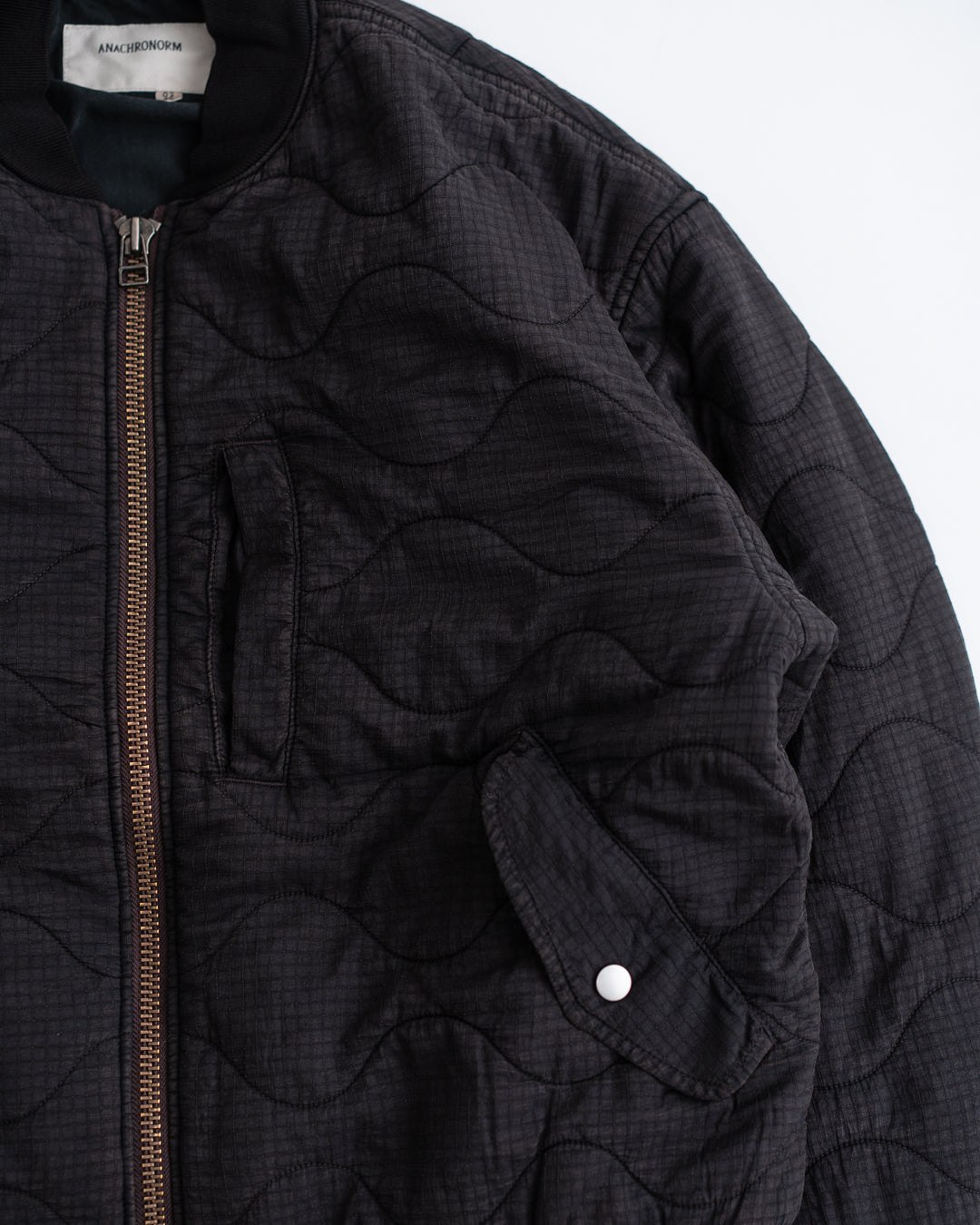 ANACHRONORM NYLON QUILTING BOMBER JACKET