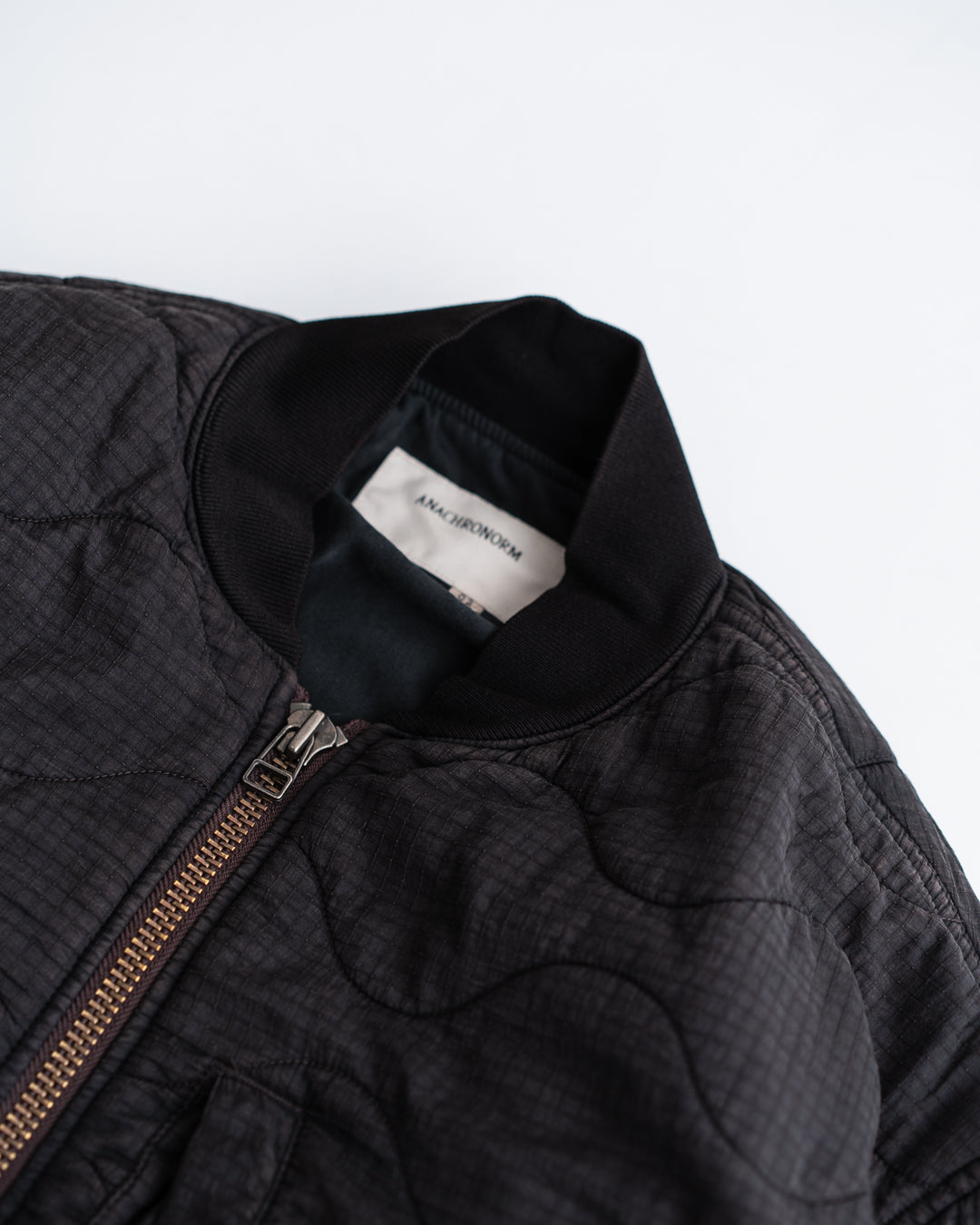 ANACHRONORM NYLON QUILTING BOMBER JACKET