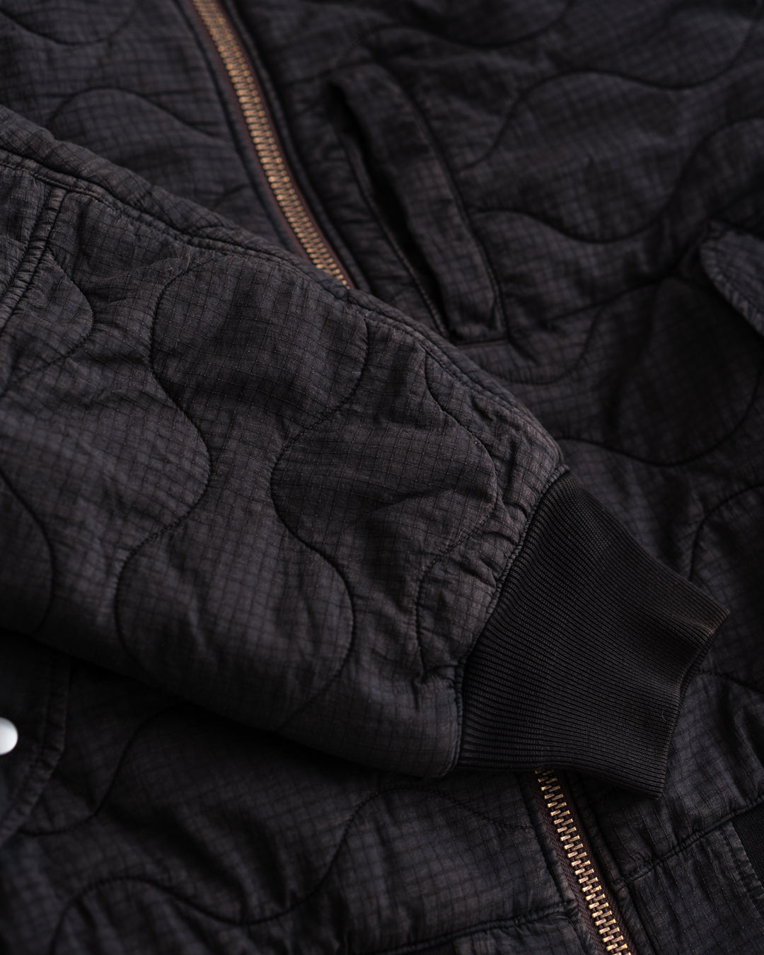 ANACHRONORM NYLON QUILTING BOMBER JACKET