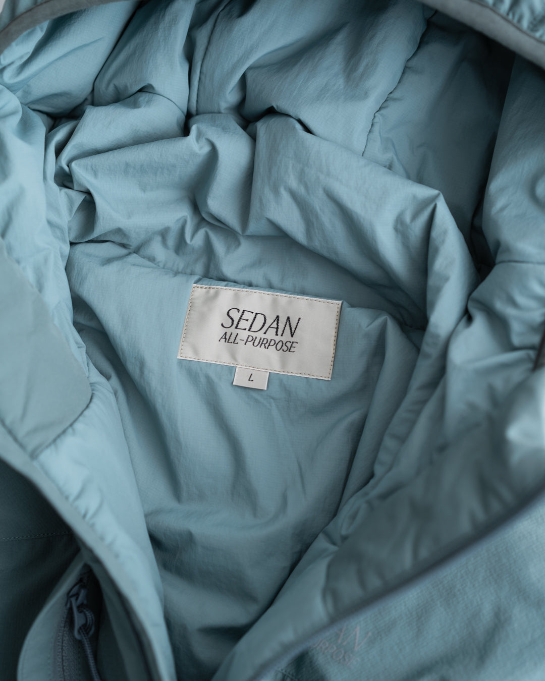 [10.31sat 12:00 Release] SEDAN ALL-PURPOSE Strech Puff Hoodie
