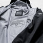 【limited】HUNTING WORLD CRAFTED BY DESCENTE.LAB HARD SHELL ASYMMETRY FIELD JACKET