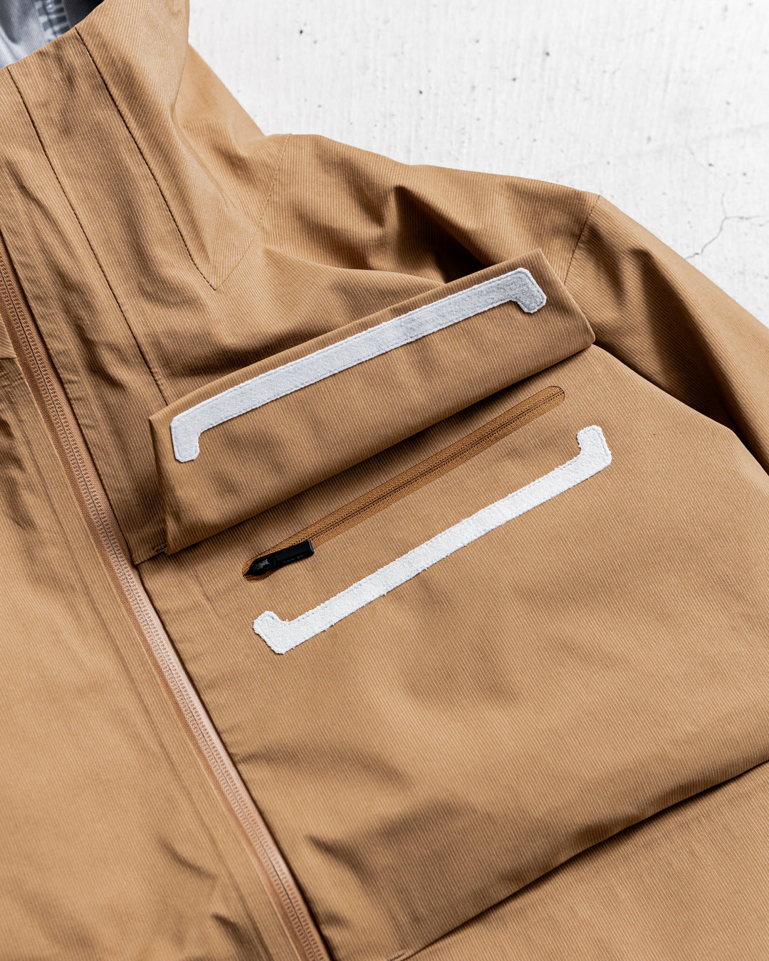 【limited】HUNTING WORLD CRAFTED BY DESCENTE.LAB HARD SHELL ASYMMETRY FIELD JACKET