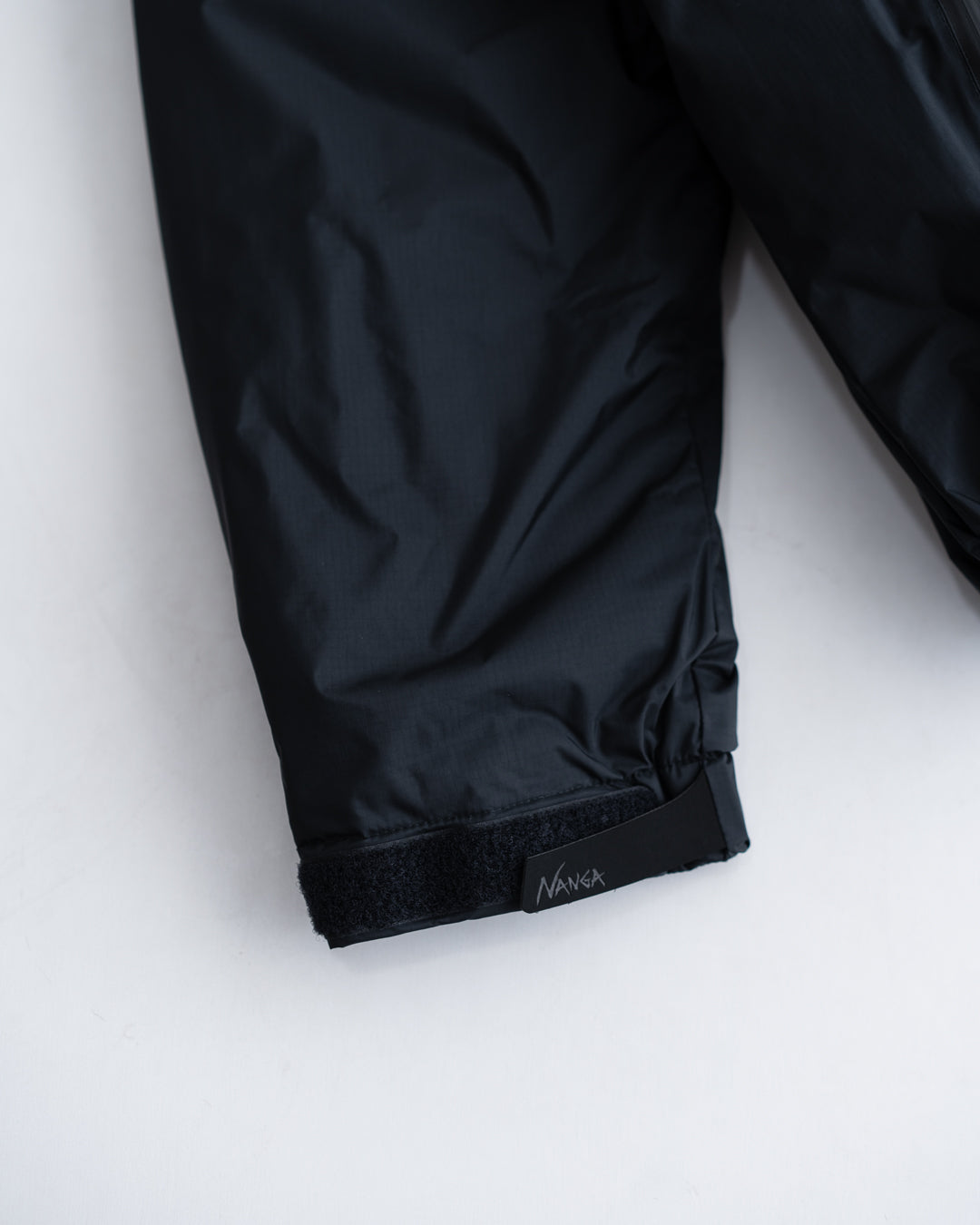 NANGA AURORA TEX STAND COLLAR DOWN JACKET