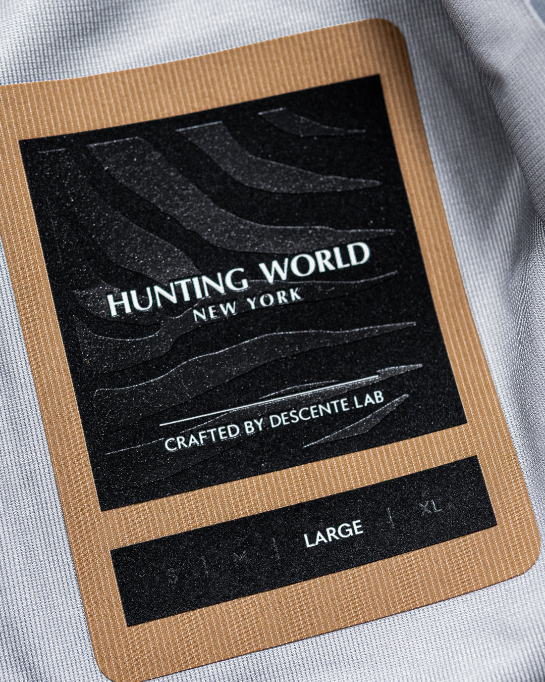 【limited】HUNTING WORLD CRAFTED BY DESCENTE.LAB HARD SHELL ASYMMETRY FIELD JACKET