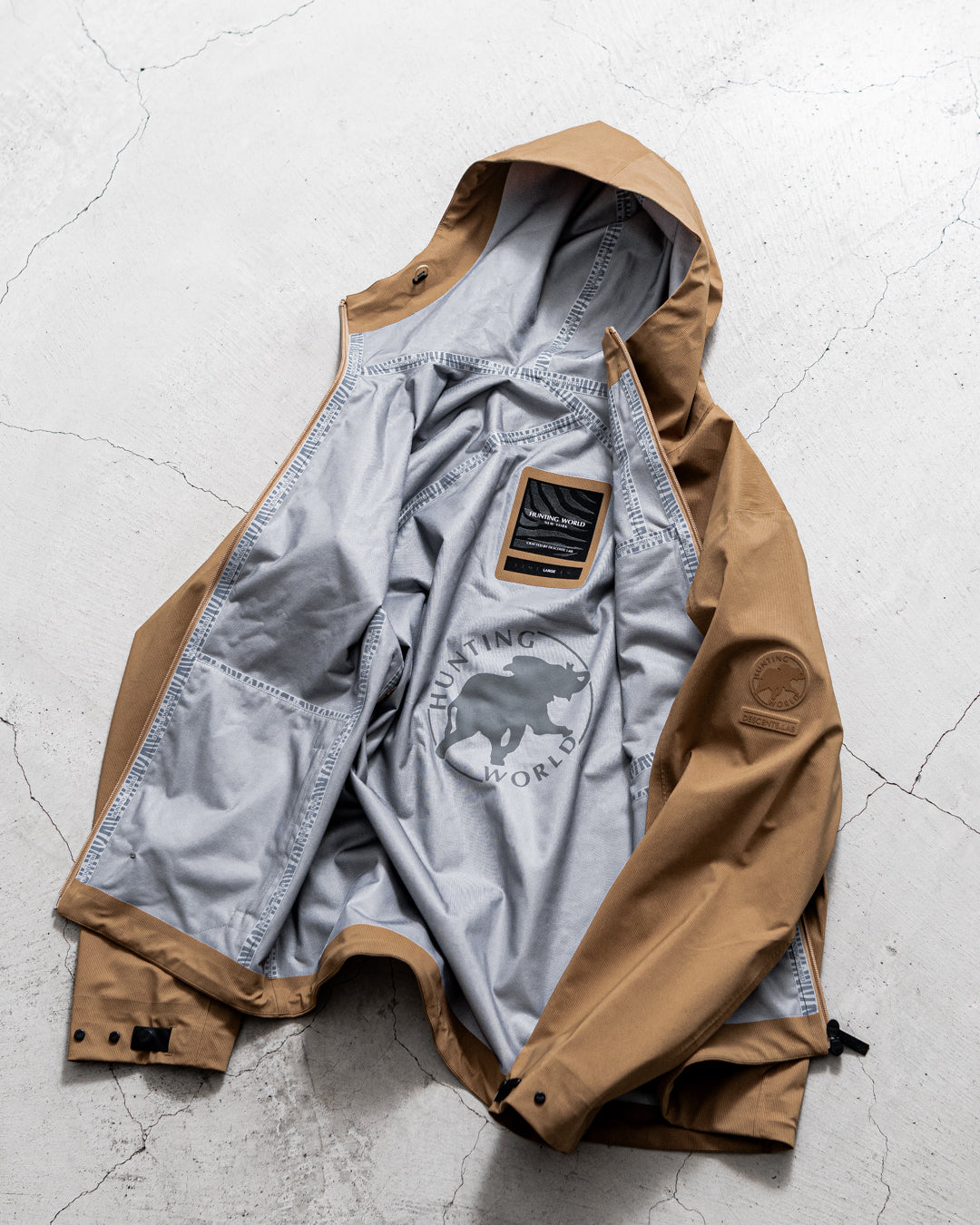 【limited】HUNTING WORLD CRAFTED BY DESCENTE.LAB HARD SHELL ASYMMETRY FIELD JACKET