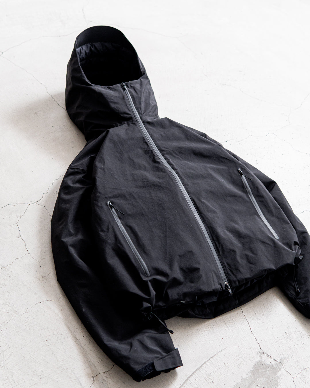 ES.1 3lyr down hoodie