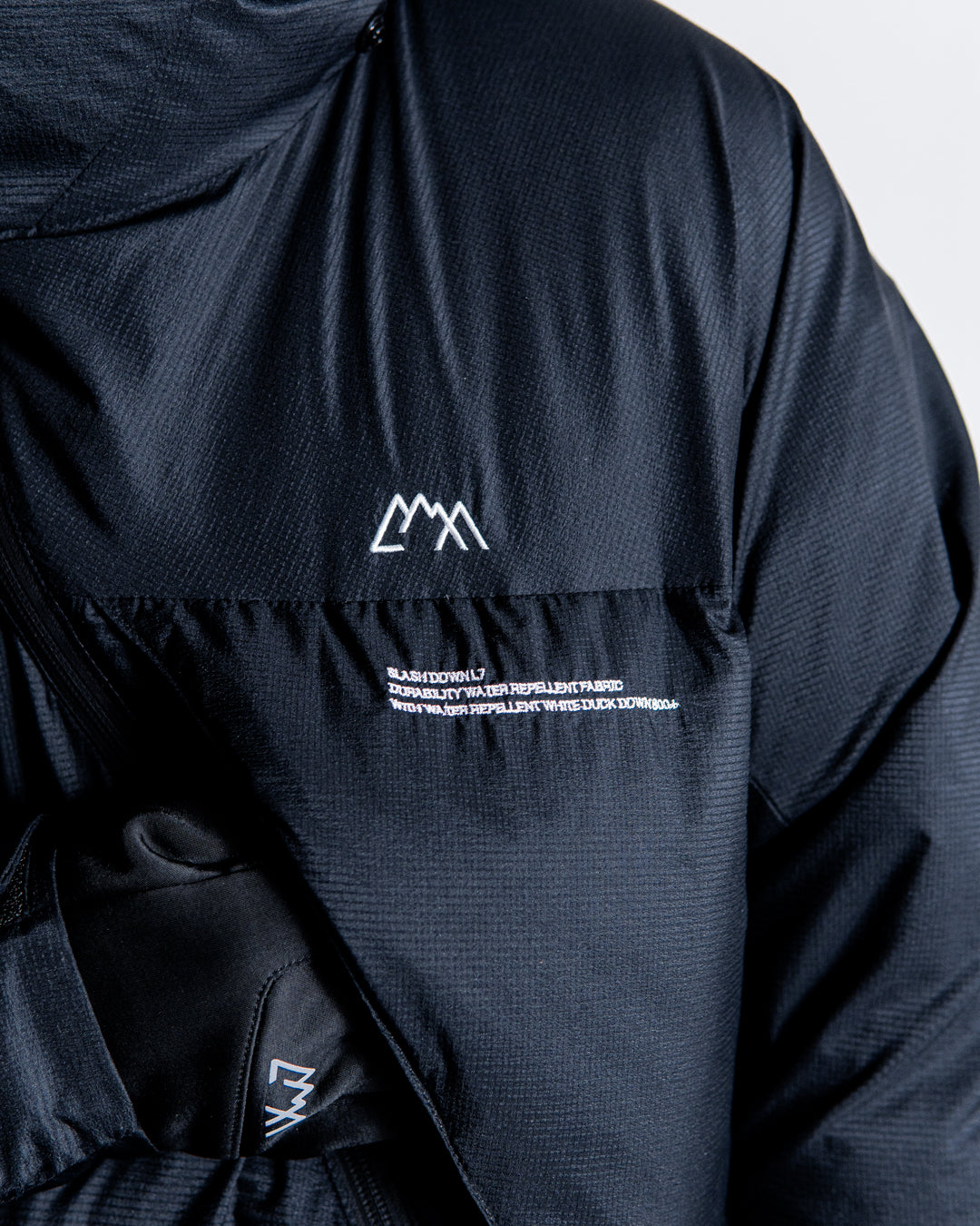 CMF OUTDOOR GARMENT SLASH DOWN L7