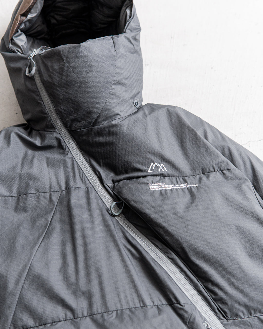 CMF OUTDOOR GARMENT SLASH DOWN L7