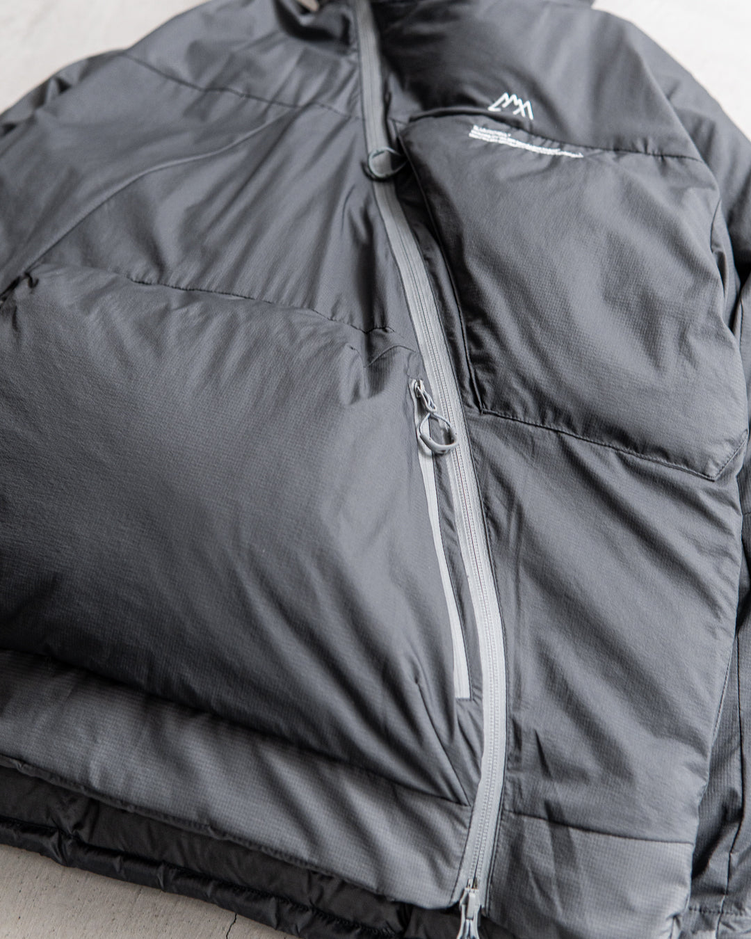 CMF OUTDOOR GARMENT SLASH DOWN L7