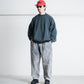 ANACHRONORM SULFUR DYED TUCK WIDE TROUSERS SULFUR