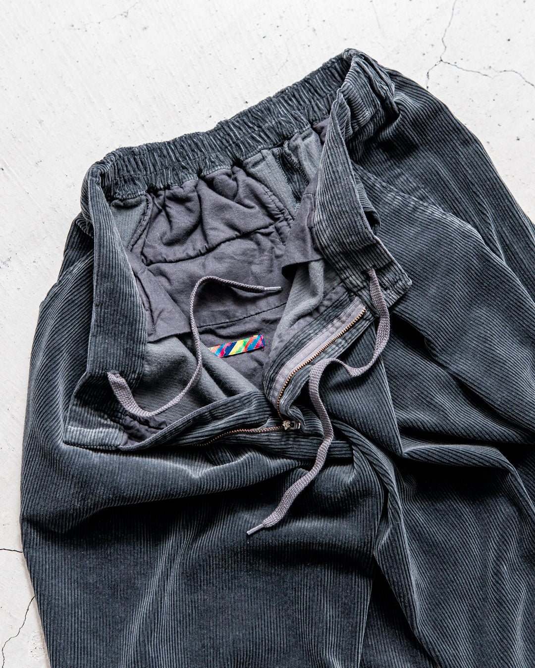 is-ness CORDUROY TUCK TROUSERS
