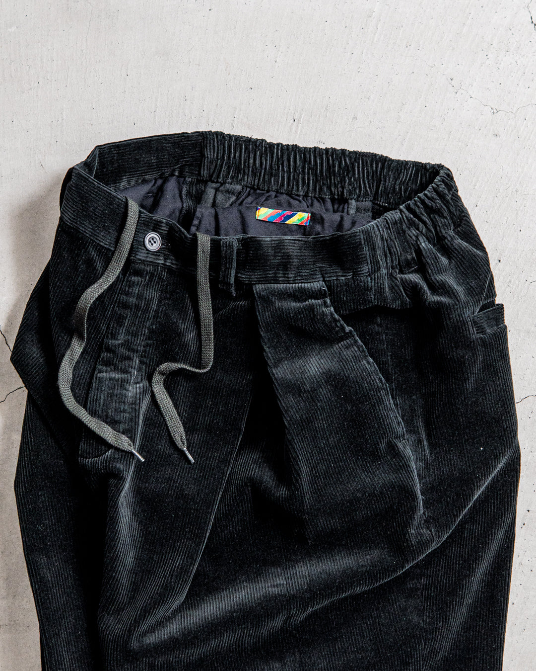 is-ness CORDUROY TUCK TROUSERS