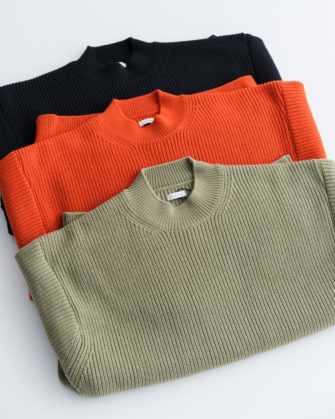 Name. FRENCH WOOL MOCKNECK KNIT SWEATER