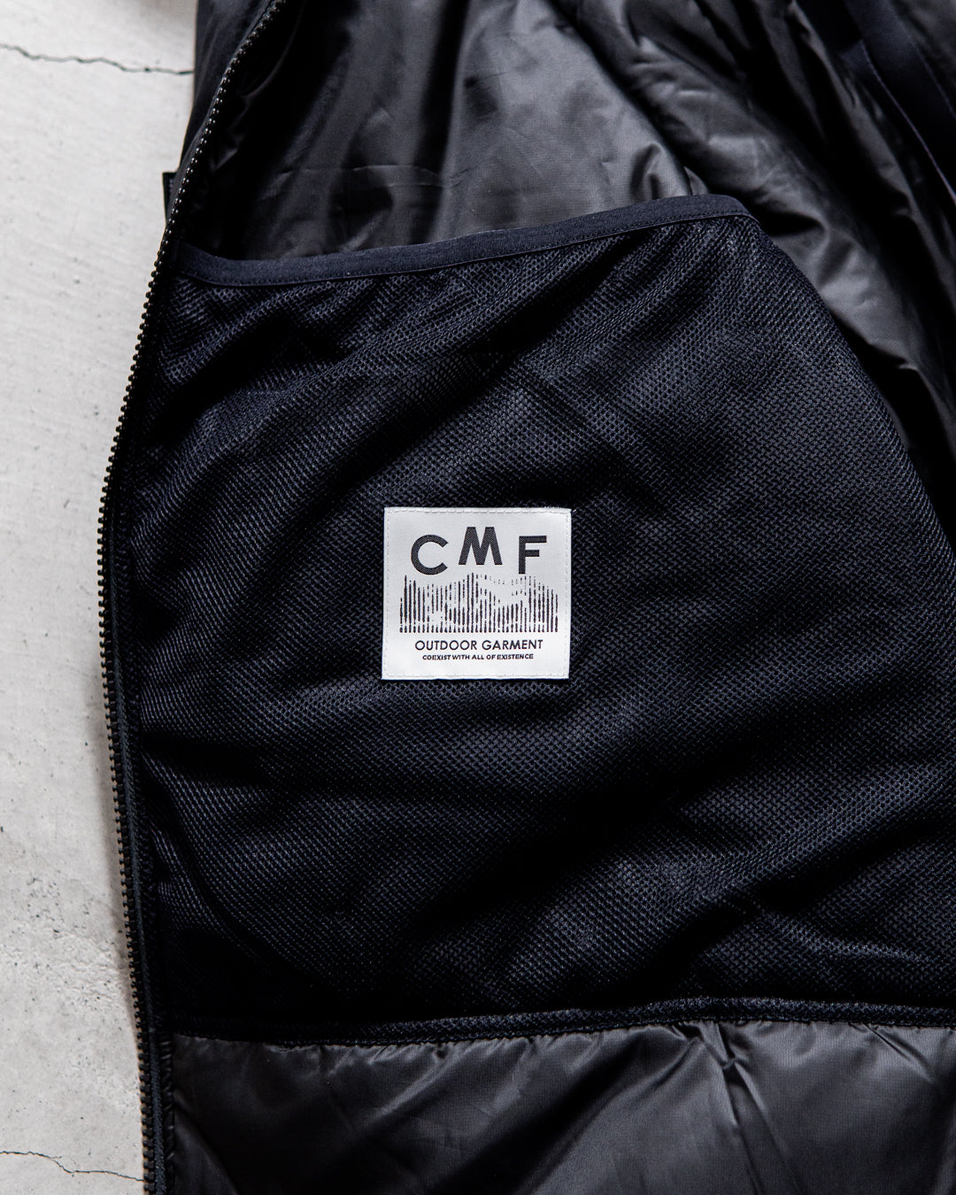 【collabolation】CMF OUTDOOR GARMENT × WILD THINGS WT HAPPY JKT