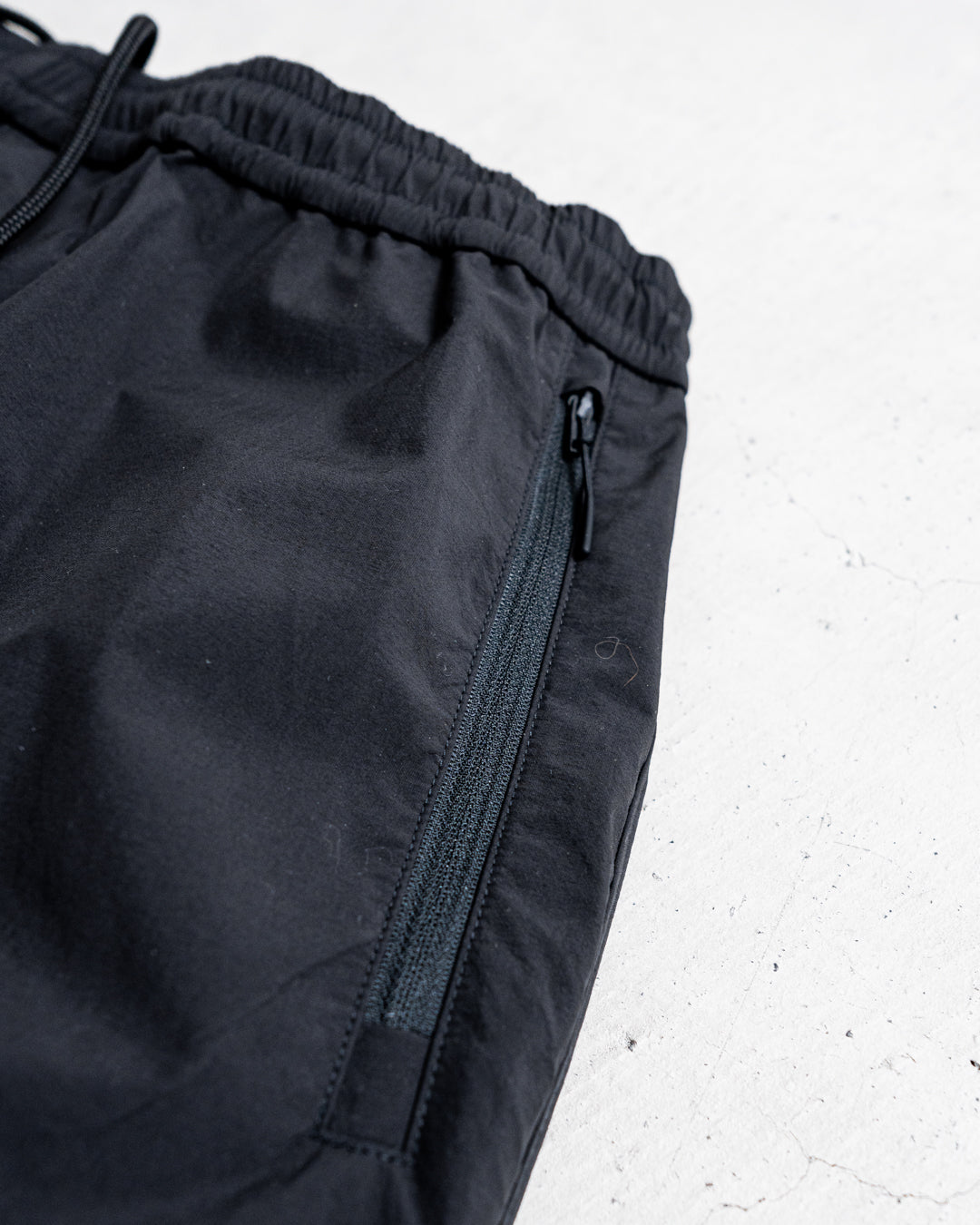 ES.1 Nylon Pants