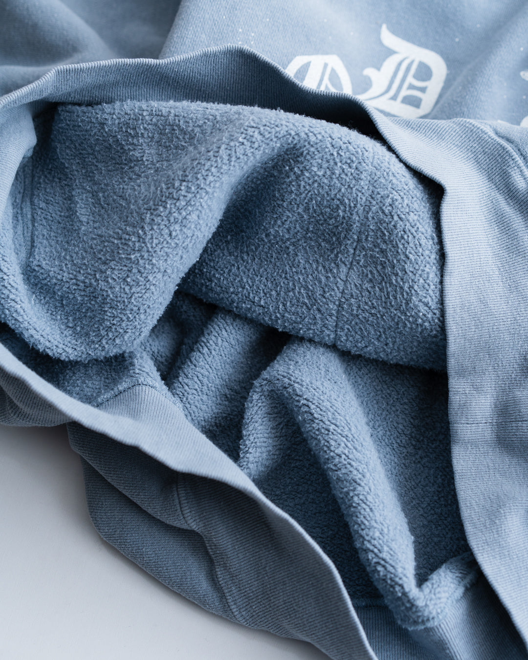 REMI RELIEF SP加工起毛裏毛パーカー(GOD rides a)